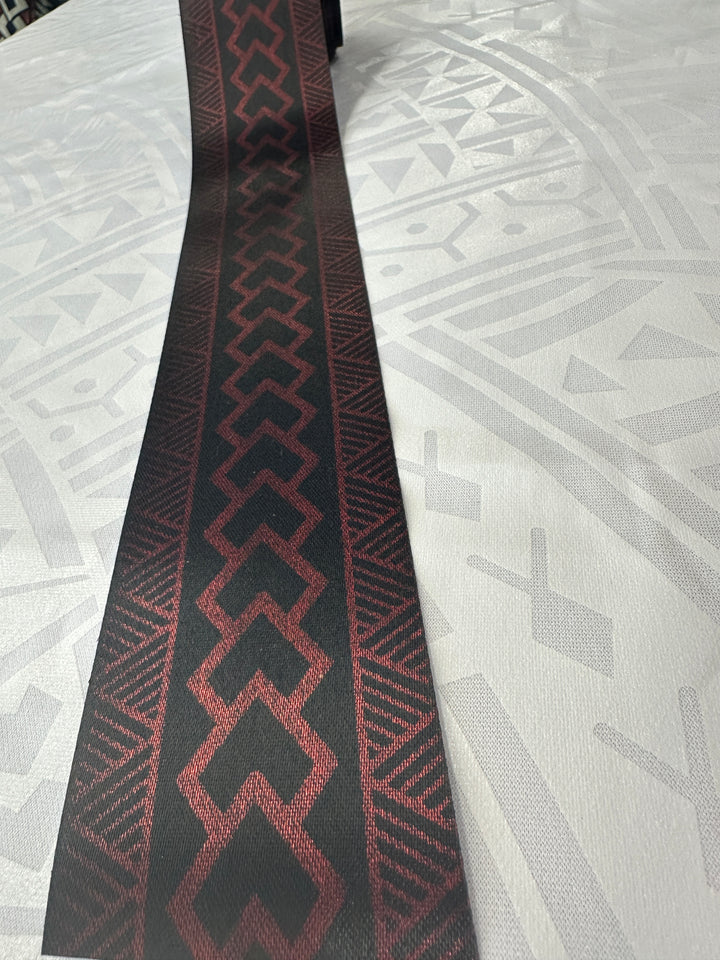 7 3/4 yards of 2 1/2” metallic red on black ribbon